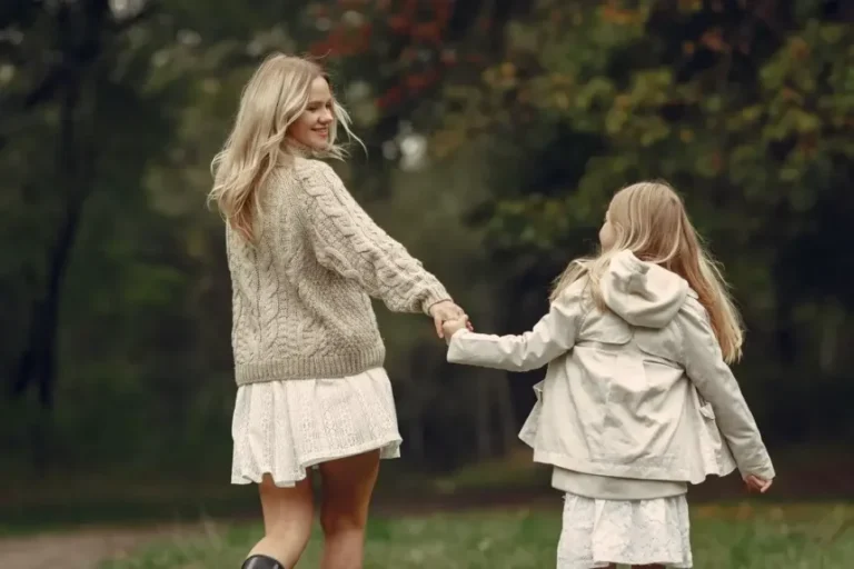 fashionable-mother-with-daughter-people-walks-outside_1157-42400-860x573