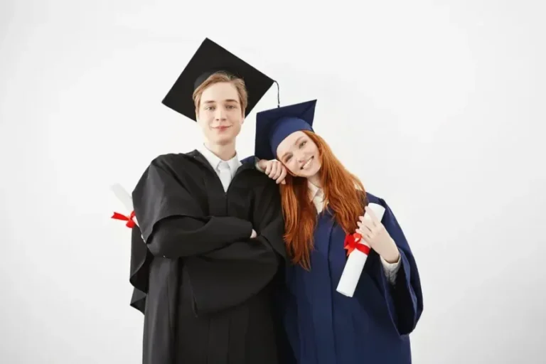 happy-graduates-university-smiling-posing-holsing-diplomas_176420-14267-860x573